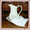 white ceramic water pitchers